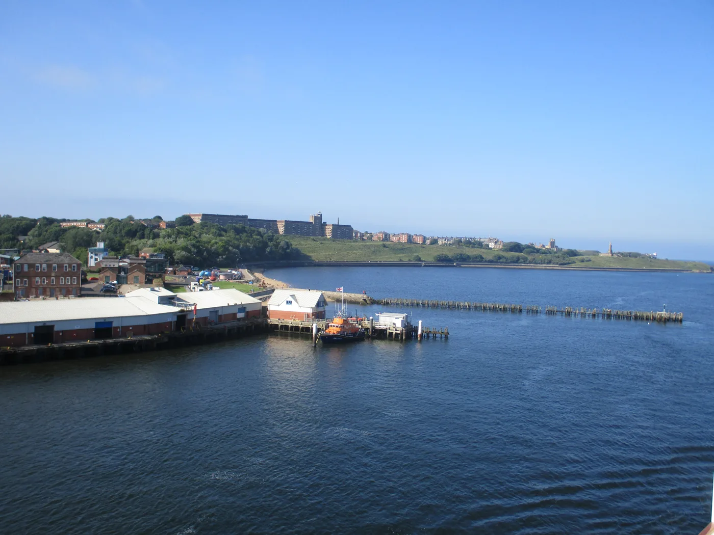 Tynemouth Lifeboat Station at the mouth of the Tyne, seen from the river. James Waters volunteers on the station's crew